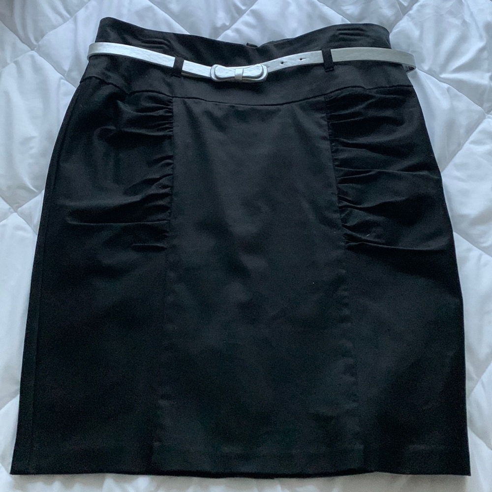 Juniors skirt. Black, knee length.
